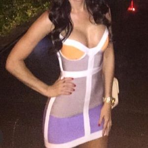 white bandage dress with purple and orange